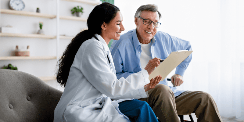 Doctor reviewing test results with a patient 